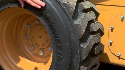 how to fix a cut in a skid-steer tire|skid loader tire repair without jack.